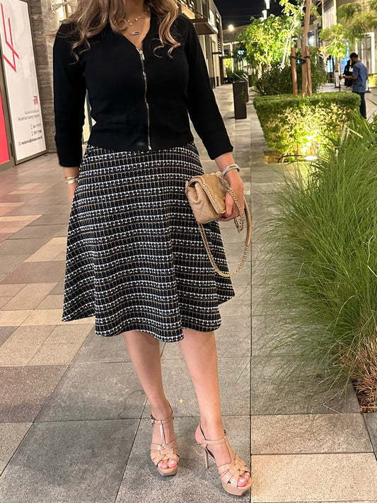 Textured knit midi skirt.