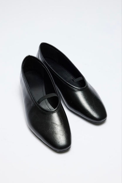 Soft leather kitten heel shoes.